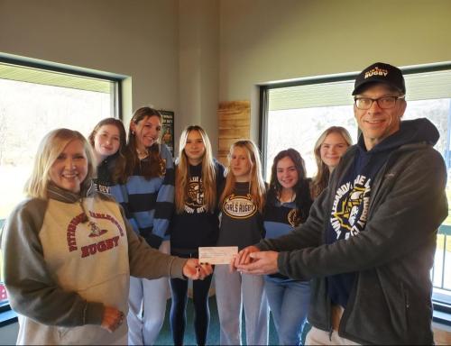 Presenting grant donation to Mt. Lebanon Girls Rugby Team